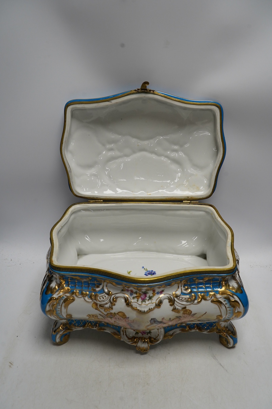 A large Sevres style porcelain casket, 33cm wide. Condition - good